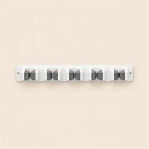 Soporte de pared para escobas